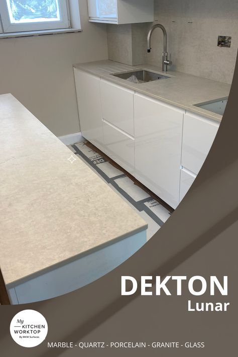 Dekton Lunar is a great choice for kitchen worktops. It has an ultra-compact surface that resists knocks, scratches and stains like a champ. Plus, it's so heat resistant that you can put hot pans directly on it without worrying about it.

Another advantage is that it's unaffected by harsh chemicals, so you can clean it with anything. It's also UV resistant, so it won't fade or deteriorate in the sun. Dekton Lunar, Kitchen Worktop, Work Tops, Apartment, Good Things, Canning