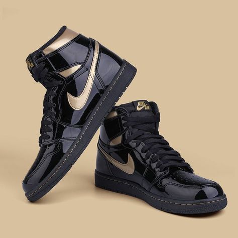 Nike Air Jordan 1 Retro High OG “Black Metallic Gold” has just landed on Kickscrew.com It featured black and metallic gold color scheme. made of black patent leather with golden lacquer Swooshes and ankle collar. Other details include a nylon tongue with the "Nike Air" trademark affixed to the black rubber sole. Cop this hot item at Kickscrew.com now! Shoes Sneakers Black, Metallic Gold Color, Nike Air Jordan 1 Retro, Air Jordan 1 Retro High Og, Air Jordan 1 Retro High, Nike Air Jordan 1, Air Jordan 1 Retro, Jordan 1 Retro High, Jordan 1 Retro