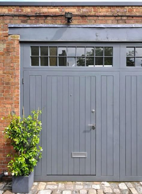 door within door, converted stable, london Garage Door Trim, Metal Garage Doors, Carriage House Doors, Garage Door Types, Converted Garage, Doors Ideas, Carriage Doors, Garage Door Design, Garage Conversion