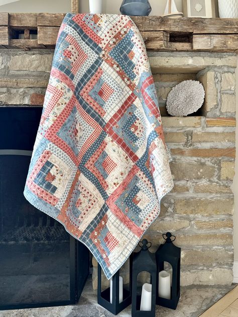 We love a vintage style quilt! 🩵⁠ ⁠ Sara Brown @sarabquilts paired the sun-washed, Americana vibes of Lisa Audit's new Countryside line with Helen Philipps Design’s Vintage Log Cabin quilt pattern. The delicate red, whites and blues also make a perfect Fourth of July quilt! 🇺🇸  ⁠ ⁠ For more photos and tips on how to make, be sure to check out our blog! Countryside fabric is available online and in shops now. Log Cabin Quilt Color Combinations, Blue Log Cabin Quilts, Fourth Of July Quilt, Suttons Bay Michigan, Courthouse Steps Quilt, Americana Quilt, Vintage Log Cabin, Sara Brown, Log Cabin Patchwork