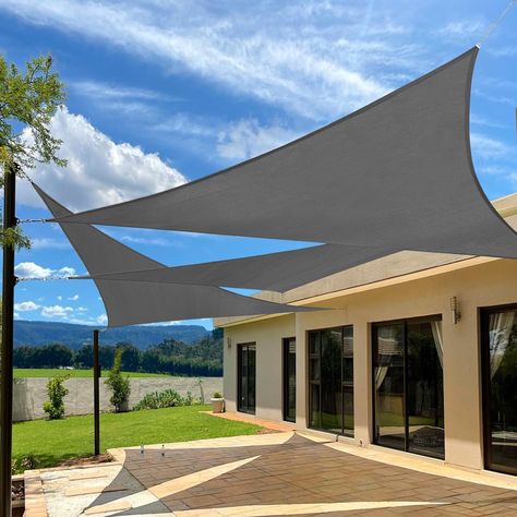 PRICES MAY VARY. Material: Made of 185 gsm UV-protected high-density polyethylene (HDPE) shade fabric; features strong stitched seams; durable stainless steel D-rings in each corner for easy attachment UV Blockage: Blocks up to 95% of harmful UV rays; breathable fabric reduces heat without trapping hot air; protects skin from direct sunlight exposure Breathable Design: Allows cooling breezes and light through; lets rain drain to prevent pooling; not waterproof; install at a 30-degree angle for b Sun Sails, Triangle Shade Sail, Triangle Sun Shade, Sail Canopies, Backyard Shade, Sun Shade Sail, Sun Sail Shade, Backyard Pergola, Shade Cloth