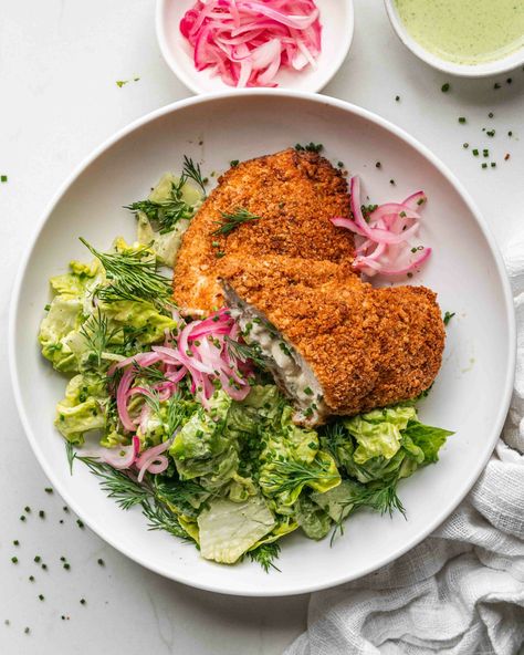 Homemade Chicken Kiev, Boursin Salmon, Kiev Chicken, Dinner For Guests, Chicken Kiev Recipe, Boursin Cheese Recipes, Lemon Salad, Chicken Kiev, Hearty Dinner Recipes