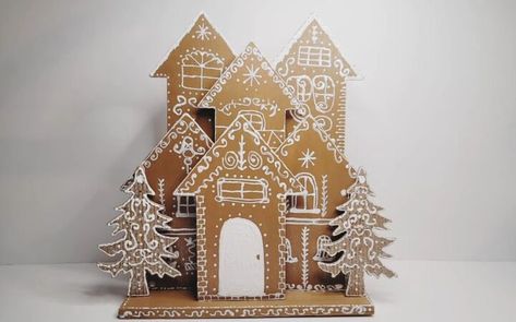 Let's make a DIY gingerbread village using wooden arrows, a wooden plank, a few Christmas tree ornaments, and paint - all from Dollar Tree. Diy Gingerbread Village, Glitter Fabric Paint, Cardboard Gingerbread, Mason Jar Bird Feeders, Ginger Bread House Diy, Diy Gingerbread, Cardboard Christmas Tree, Jars Diy, Gingerbread Diy