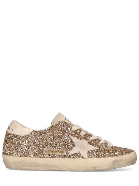 Find Golden Goose Deluxe Brand Lvr Exclusive Super-star Glitter Sneaker on Editorialist. Front lace-up closure. Glittered upper. Leather details. Logo details. Leather insole. Rubber sole Golden Goose Gold Glitter, Gold Golden Goose, Golden Goose Glitter, Gold Sneakers, Glitter Sneakers, Golden Goose Deluxe Brand, Soft Classic, Latest Sneakers, Super Star