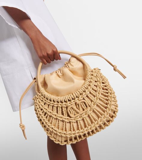 VLogo Signature raffia-effect bucket bag in beige - Valentino Garavani | Mytheresa Valentino Garavani Bag, V Logo, Leather Thong Sandals, Drawstring Top, Studded Leather, Lining Fabric, Free Bag, Valentino Garavani, Bags Women