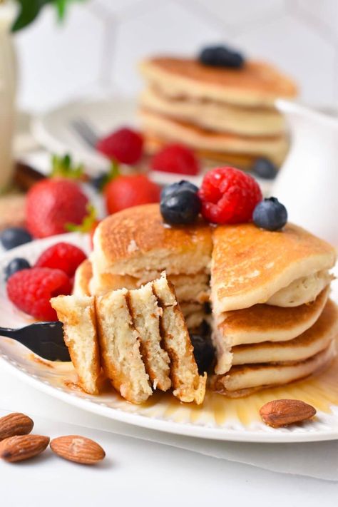 These fluffy Vegan Almond Flour Pancakes are easy, fluffy vegan gluten-free pancakes with no banana required! As a result, they are slightly low carb compared to a regular vegan pancake recipe since almond flour, like coconut flour, contains less carbs than regular flour blend. Serve them as a stack with berries and a drizzle of maple syrup for the best vegan gluten-free breakfast. Almond Flour Banana Pancakes, Vegan Pancake Recipe, Vegan Gluten Free Pancakes, Chia Seed Jam Recipe, Vegan Pancake, Vegan Gluten Free Breakfast, Almond Pancakes, Vegan Pancake Recipes, Almond Flour Pancakes