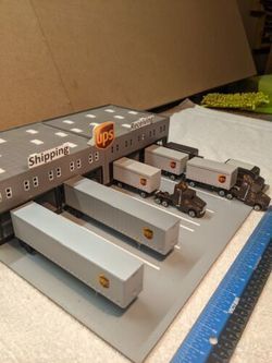 Ho scale building and trucks. Custom made UPS building and all trucks | #4563697010 Dodge Coronet Super Bee, Ho Scale Buildings, American Graffiti, Dodge Coronet, Foose, Fire Rescue, Ho Scale, House Prices, 3d Printed