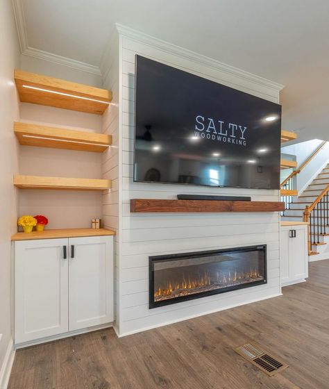 Share your electric fireplace project for #NationalSwapIdeasDay and help someone out in need of inspo! 🤩 Check out @saltywoodworking_ for some brilliant design ideas! #luxuryroom #interiordesign #housegoals #fireplaceideas #livingroomgoals #livingroomideas #interiordesign #electricfireplace #touchstonehomeproducts Electric Fireplace And Built Ins, Built In Shelves Living Room Electric Fireplace, Electric Wall Fireplace Ideas, Basement Electric Fireplace Ideas, Electric Fireplace Ideas With Tv Built Ins, Basement Electric Fireplace, Built In Electric Fireplace Ideas, Fireplace Basement, Fireplace With Cabinets