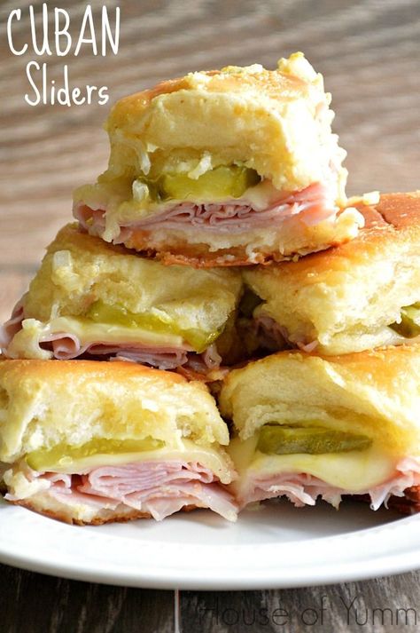 These sliders are loaded with ham, swiss cheese, dill pickles, and topped with a dijon mustard-onion spread. Get the recipe from House of Yumm. - Delish.com Cuban Sliders, Slider Buns, Dill Pickles, Slider Recipes, Cuban Recipes, Think Food, Football Food, Soup And Sandwich, Swiss Cheese