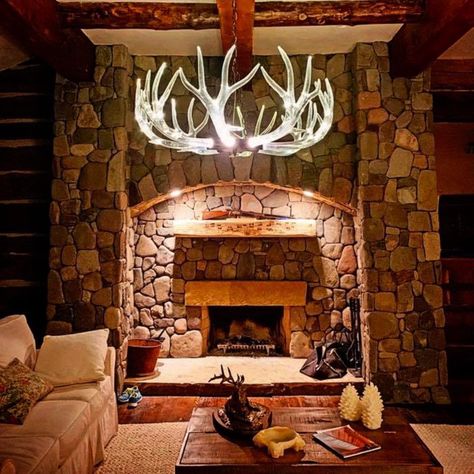 We fell in love with this cozy home in Colorado. The Industrial style Crystal Antler Chandelier really sparkles! #cabinstyle #antlerchandelier  #glassantlerchandelier #lighting #mountainhome #ranchstyle #rusticmodern #chandelier #interiordesign #antlers Cozy Mountain Home, Fine Art Lighting, Antler Chandelier, Cabin Style, Venue Ideas, Mountain Home, Forged Steel, Luxury Lighting, Mountain House