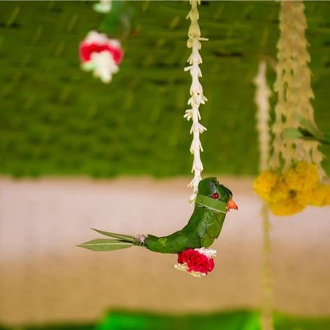 Manmade parrot with palm leaves.... #indianweddingblog #saree #designerblouse #teluguwedding #telugubride #tamilwedding #tamilbride #weddingbrigade #gorgeousbride #shopzters #shaadimagic #bridesessentials #ezwed #pellipoolajada #southindianbride #southindianwedding #templejewellery #southindianweddingdecor Leaf Decor Wedding, Home Flower Decor, Diy Floral Decor, Flower Garland Wedding, Diwali Decorations At Home, Wedding Background Decoration, Diy Diwali Decorations, Marriage Decoration, Wedding Planning Decor