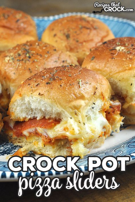 These Crock Pot Pizza Sliders are a crowd favorite! Better yet, they are super easy to throw together and cook quickly. Win win! Sandwiches To Feed A Crowd, Crock Pot Pitch In Recipes, Easy Dinner Ideas To Feed A Crowd, Crock Pot Sliders Recipes, Hot Potluck Dishes Crockpot, Crowd Pleasing Crockpot Recipes, Crock Pot Food For Party, Easy Recipes For Large Groups, Sliders In Crockpot