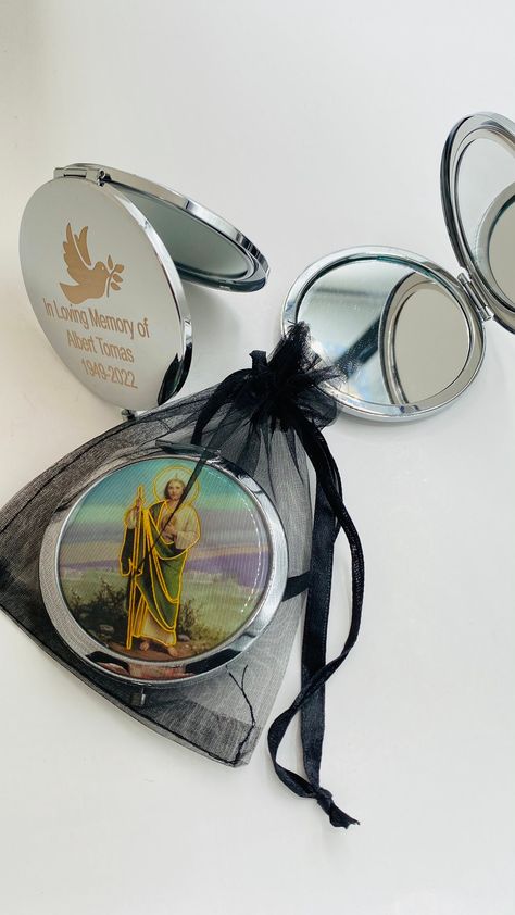 "all orders are CUSTOM MADE to your specifications; All SALES ARE FINAL. We DO NOT offer any refunds, remakes or exchanges.  Thank you for understanding this policy before placing your order. St Jude  Funeral favors Favors  Memorial service gift Double sided mirrors  Magnifying from one side  Recuerdos para funeral personalizados  Samples:      In loving Memory  #1: Ann Pollsters       2/3/56-7/2/22   #2:   DEP          Jose R.      5/5/60-3-4-21   #3: In loving Memory          Charly Caster  #4:  Descase en paz         Aldo Arana  FREE organza bags  Beautiful and unique design  Keychains size: 2\" inches    This Keychain is perfect for religious gift. See my other listings for more great items!  all orders are CUSTOM MADE to your specifications; All SALES ARE FINAL. We DO NOT offer any re Favors For Celebration Of Life, Personalized Memorial Gifts Spanish, Spiritual Hallmarked Necklaces For Memorials, Memorial Buttons For Funerals, Memorial Key Chain Mom, St Jude, Baptism Favors, Memorial Service, Religious Gifts