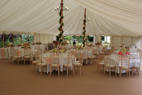 Gorgeous traditional marquee with full interior lining, round tables with abundance of beautiful flowers and greenery weaved perfectly around the poles Tent Pole Decorations, English Country Garden Wedding, Marquee Decoration, Tent Wedding Reception, English Country Weddings, Shabby Chic Theme, Marquee Hire, English Country Garden, Country Garden Weddings