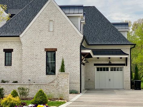 Cream Exterior Brick, White Hillstone Brick, Brick Wood Storage, Palmetto Brick Myrtle Sand, Oyster Bay Brick Exterior, Myrtle Sand Brick, Chesapeake Pearl Brick With White Mortar, Transitional Brick House Exterior, Neutral Brick House Exterior