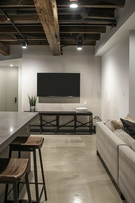 Creative Small Basement Ideas for Low Ceilings Basement Exposed Ceiling Ideas, White Exposed Basement Ceiling, Basement Ceiling Painted Black, Low Basement Ceiling, Low Ceiling Basement Ideas, Open Ceiling Basement, Black Basement Ceiling, Ideas For Low Ceilings, Small Finished Basement Ideas