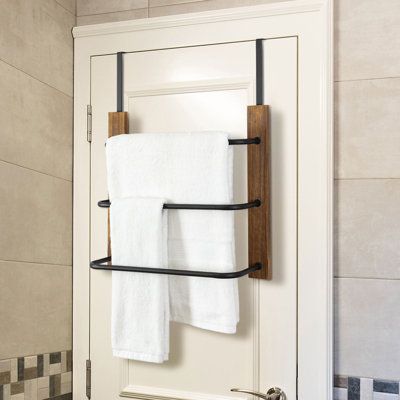 Featuring 3 horizontal bars for towels and a modern black finish, this metal, and solid wood storage rack could easily hang over the top of any door up to 2" thick and keep your space free of clutter. Hang it in your bathroom for bath and hand towels to be neatly hung. This towel rack requires no tools and allows you to immediately use it once installed, simply hang the top hooks over your door and it instantly adds more storage space anywhere it is placed. It blends the distinctive outlook and Towel Hanger Ideas Bathroom, Towel Rack Bathroom Hanging Ideas, Bathroom Towel Hanging Ideas, Towel Hanging Ideas, Over The Door Towel Rack, Small Bathroom Towel, Door Towel Rack, Guest Bathroom Towels, Hanging Towel Rack