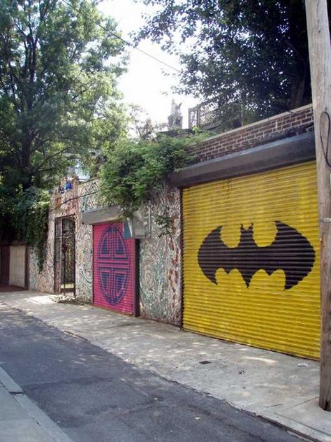 Close Calls: 12 Breathtakingly Creative Garage Doors | Urbanist Batman Garage, Garage Door Murals, Garage Door Mural, Unique Garage Doors, Online Background, Garage Door Paint, Close Calls, History Background, Garage Door Makeover