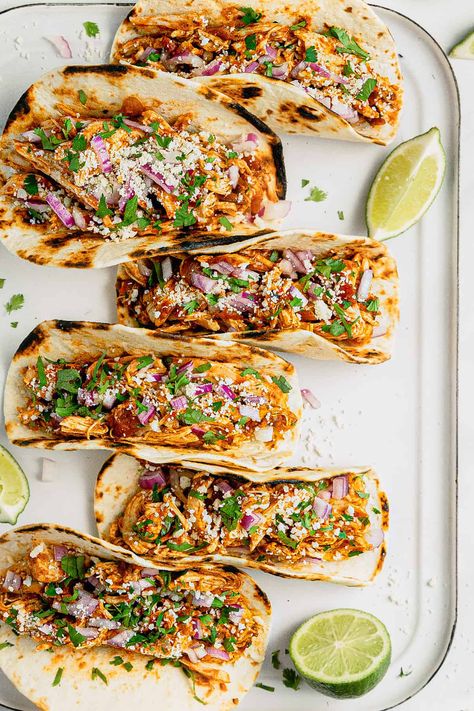 Healthy Slow Cooker Chicken Tacos | Midwest Foodie | With just 5 minutes of prep time, these 5 ingredient slow cooker chicken tacos are healthy, tasty and almost too easy to make! Toss everything in the crock pot, come back a few hours later, shred the chicken and you're ready to sit down for dinner! Pulled Chicken Tacos, Slow Cooker Chicken Healthy, Chicken Crockpot Recipes Healthy, Slow Cooker Shredded Chicken, Easy Taco Recipes, Slow Cooker Chicken Tacos, Shredded Chicken Tacos, Chicken Tacos Crockpot, Slow Cooker Tacos