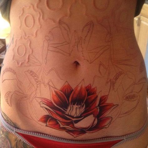 Red Lotus Tattoo Idea Girl Stomach Tattoos, Ladybug Tattoos, Lower Belly Tattoos, Lotusblume Tattoo, Lower Stomach Tattoos, Men Flower Tattoo, Ladybug Tattoo, Spiritual Tattoo, Lotus Flower Tattoo Design