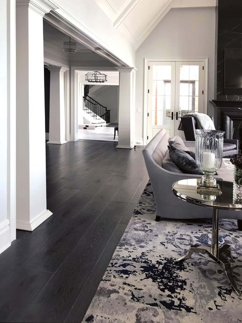 Dark Wood Wide Plank Floors, Black Vinyl Flooring Living Room, Luxury Hardwood Floors, Black Floor House, Modern Home Dark Floors, Vinyl Flooring Black, Dark Plank Flooring, Dark Tile Living Room, Ebony Hardwood Floors