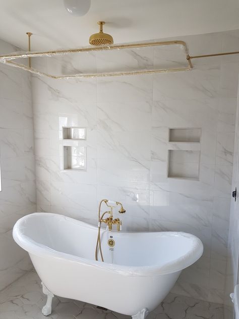 Victorian Marble bathroom with clawfoot tub. Hardware info and before/after on IG. Clawfoot Tub Shower Combo, Clawfoot Tub With Shower, Tub Hardware, Bathroom With Clawfoot Tub, Clawfoot Tub Bathroom, Cherry House, Clawfoot Tub Shower, Small Tub, Waterfall Shower