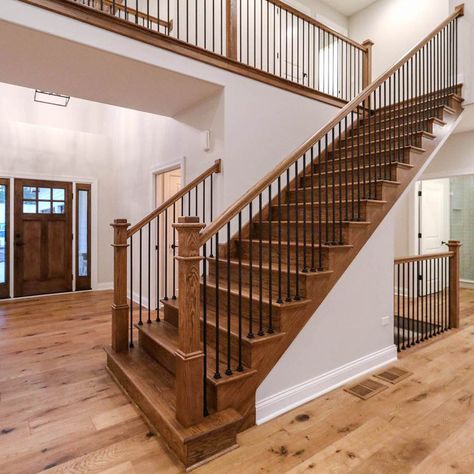 Brown Wood Staircase, 2nd Floor Railing Ideas, Second Floor Railing, Wrought Iron Stair Railing With Wood Banister, Oak And Iron Stair Railing, Staining Stair Rail, Oak Stairs With Iron Spindles, Restaining Wood Stair Railing, Log Cabin Stair Railing Ideas