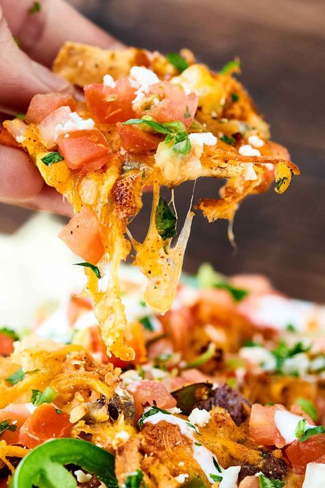 Loaded Chicken Nachos Recipe - Crockpot Chicken, Vegetables, & More! Loaded Chicken Nachos Recipe, Loaded Chicken Nachos, Shrimp Nachos, Steak Nachos, Chicken Beans, Steak Shrimp, Chicken Nachos Recipe, Loaded Chicken, Recetas Puertorriqueñas