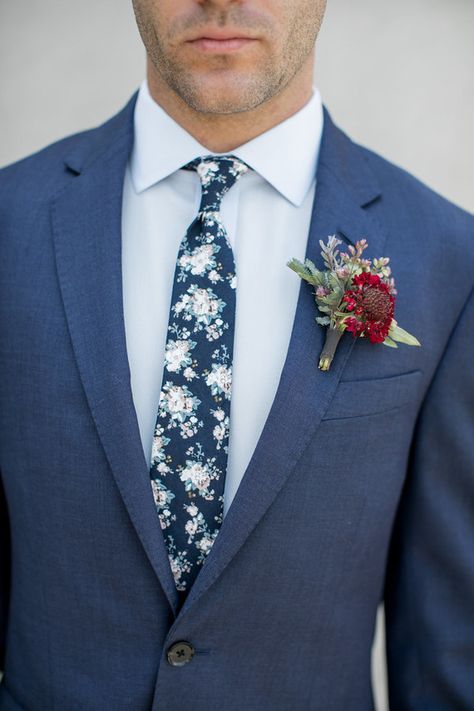 Fall boutonnière ideas with The Black Tux Tux Wedding Party, Boutonnière Ideas, Navy Groomsmen Suits, Black Tux Wedding, Groom Blue Suit, Fall Boutonnieres, Mens Floral Tie, Groomsmen Tie, Blue Floral Tie