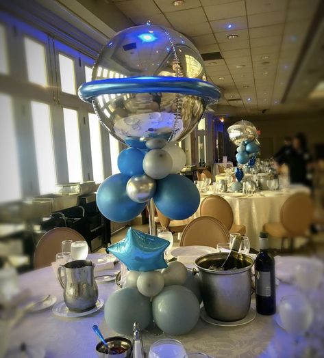 Diy Planet Balloons, Rocketship Centerpiece Ideas, Space Birthday Centerpieces, Space Baby Shower Centerpieces, Space Theme Centerpiece, Astronaut Centerpiece Space Party, Space Themed Centerpieces, Astronaut Centerpiece, Space Themed Baby Shower Ideas Boy