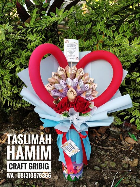 Taslimah Hamim craft Gribig, money bouquet, buket uang, buket Indramayu, buket 2022 Satin Ribbon Bouquet, Diy Bucket, Money Bouquet, Ribbon Bouquet, Money Gift, 4th Of July Wreath, Satin Ribbon, Bouquets, Projects To Try