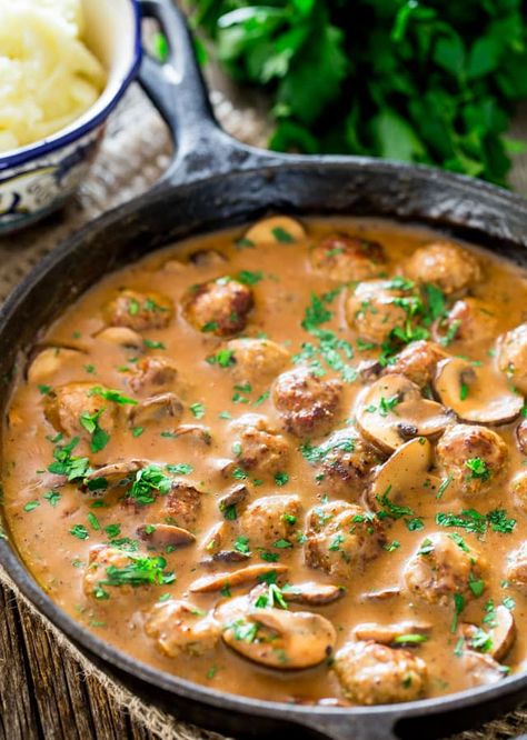 Meatballs with Mushroom Sauce - pork meatballs in a delicious creamy mushroom sauce served over mashed potatoes. Comforting and incredibly delicious! Mushroom Meatballs, Pork Mushroom, Meatballs And Gravy, Over Mashed Potatoes, Ground Pork Recipes, Jo Cooks, Pork Meatballs, Meatball Ingredients, Creamy Mushroom Sauce