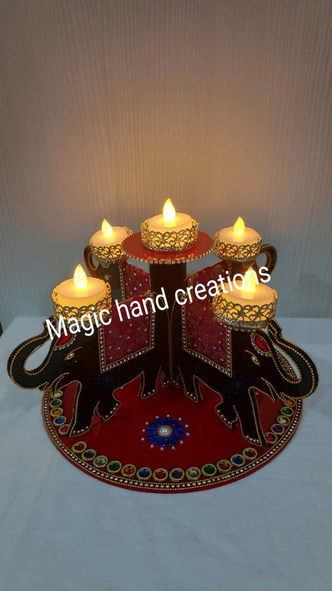 Home decore Elephant Diya stand which is given a elegant look. Diya Holder, Diy Elephant, Diwali Painting, Diya Stand, Diwali Decor, Pillow Crafts, Magic Hands, Diwali Decorations, U Can