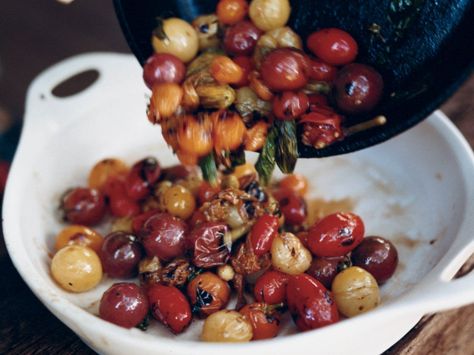 Skillet-Charred Cherry Tomatoes with Basil | Chris Cosentino remembers charring tomatoes when he was a line cook under chef Mark Miller at Red Sage in Washington, DC. "Mark always said, 'It needs... Tomatoes With Basil, Easy Dinner Party Recipes, Iron Skillet Recipes, Quick Side Dishes, Basil Recipes, Cast Iron Skillet Recipes, Fried Cauliflower, Dinner Party Recipes, Skillet Meals