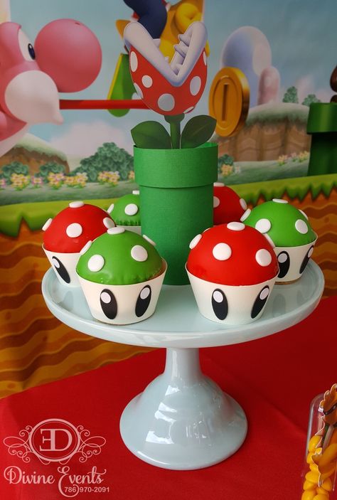 How cute are those cupcake! Mario Bros Birthday Party. Super Mario dessert table Mario Dessert Table, Super Mario Dessert Table, Mario Bros Birthday Party, Peach Mario Bros, Super Mario Brothers Party, Mario Theme, Nintendo Mario Bros, Super Mario Bros Party, Peach Mario