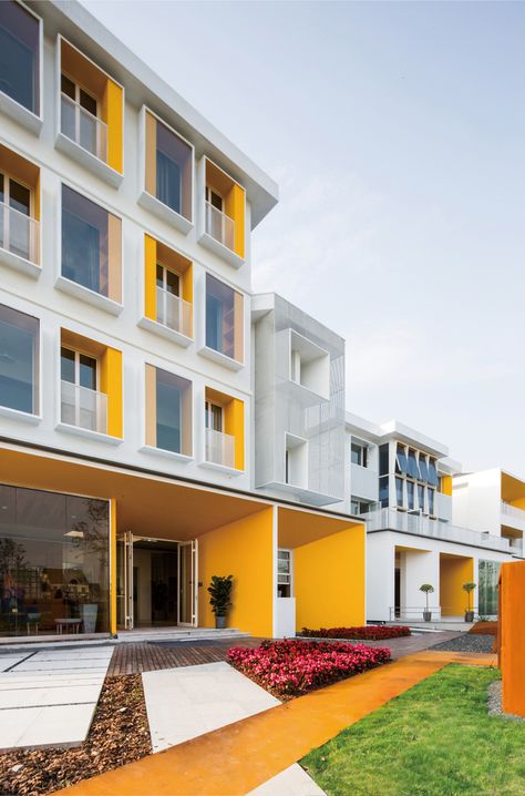 Gallery of Hongyue Garden Community / Hangzhou SSDesign - 7 Art School Design, Yellow Architecture, Yellow Building, Garden Community, School Building Design, Wayfinding Signage Design, Building Photo, Ad Photography, Colour Architecture