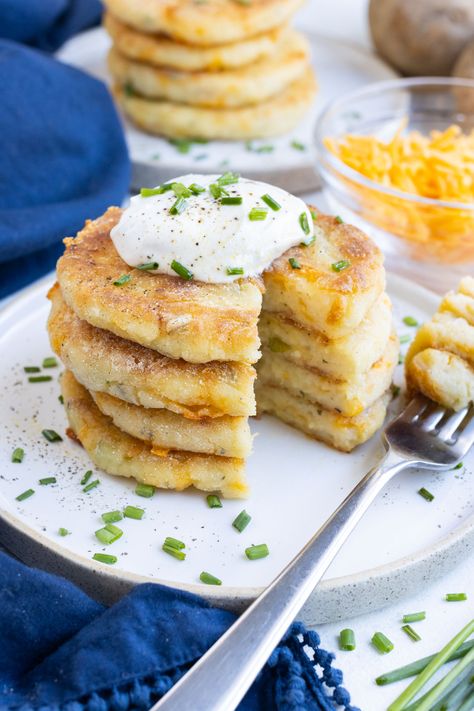 Mashed Potato Pancakes are the perfect way to use up Thanksgiving leftovers! It is surprisingly easy to mix mashed potatoes with flour, egg, cheese, and seasonings and cook them up in a skillet. This recipe results in fluffy yet crispy pancakes perfect for a lazy morning or a quick side dish. Mashed potatoes are one... Leftover Mashed Potato Pancakes, Mashed Potato Pancakes, Chocolate Chia Seed Pudding, Potato Muffins, Leftover Potatoes, Pancake Calories, Potato Waffles, Turkey Pot Pie, Leftover Turkey Recipes