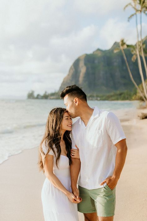 Honeymoons are the sweetest occasion to be taking pictures on. Still running on that adrenaline from your wedding and the happiness from being with your lover... so cute! This couples beach pictures is in Oahu, Hawaii! | Memories with Jy, Hawaii couples photographer #HawaiiPhotoIdeas Kauai Couples Photoshoot, Beach Pics With Husband, Hawaii Beach Engagement Photos, Pre Wedding Photoshoot Outfit Couple Photos Picture Ideas Beach, Couple Hawaii Pictures, Couples Pictures On The Beach, Cute Beach Pictures Poses, Couple Poses At The Beach, Engagement Photos Hawaii