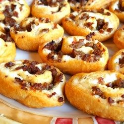 Sausage and Cream Cheese Pinwheels - Allrecipes.com Sausage And Cream Cheese, Sausage Pinwheels, Sausage Cream Cheese, Lemon Cream Cheese Bars, Tailgating Food, Cream Cheese Pinwheels, Pinwheels Recipe, Cream Cheese Crescent Rolls, Cheese Pinwheels