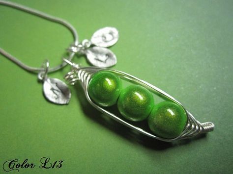 This takes me back to memories of sitting in my... Three Peas In A Pod, Pea Pod Necklace, Peas In A Pod, Plush Keychain, Pea Pods, Sweet Peas, Swarovski Pearls, Beads And Wire, Sweet Pea