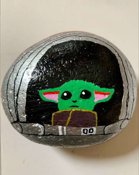 A rock painted with paint marker pens of our beloved Baby Yoda Shells Painting, Mud Kitchen For Kids, Kick Rocks, Shell Painting, Paint Marker Pen, Kid Art, Painted Shells, Rock Painting Ideas Easy, Mud Kitchen