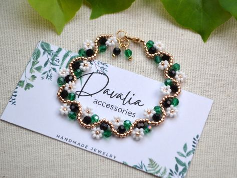 Green and black beaded flower bracelet and anklet, Daisy bracelet, Handmade with crystals and seed beads. Beaded Flower Bracelet, Daisy Bracelet, Flower Bracelet, Glass Seed Beads, Bracelet Handmade, Beads Bracelet, Black Crystals, Czech Glass, Lobster Claw