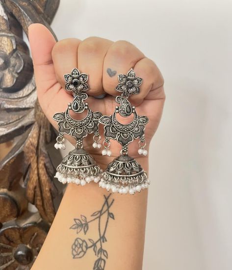 Adding these beautiful earrings to our Silver Edit Collection! ✨ Premium quality, lightweight and comfortable to wear. Available in four colors. Price - 399/- with free shipping. DM for orders and queries. 💌 Jhumka Collection, Capsule Wardrobe Jewelry, Black Metal Jewelry, Oxidised Earrings, Indian Accessories, Oxidised Silver Jewelry, Indian Jewelry Earrings, Pretty Jewelry Necklaces, Fancy Jewellery Designs