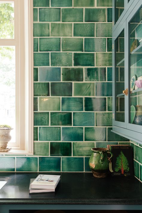 Our Emerald Green London Tiles are inspired by the traditional tiles of London tube stations and East End pub exteriors. Claire, our glaze expert, has worked to an almost scientific degree to produce the subtle variations in tones across each tile. #deVOLKitchens #HandMade #KitchenDesign Green Tiles, Devol Kitchens, Handmade Ceramic Tiles, Traditional Tile, Tile Inspiration, Tiles Design, Green Tile, Handmade Tiles, Green Kitchen