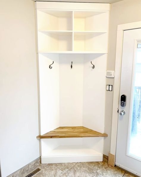 Garage Mudroom Corner, Corner Nook Entryway, Small Corner Mudroom Ideas Entryway, Small Corner Mudroom Bench, Entryway Corner Shelf, Small Corner Drop Zone Ideas, Creative Backpack Storage, Small Corner Bench Entryway, Corner Bench Mudroom