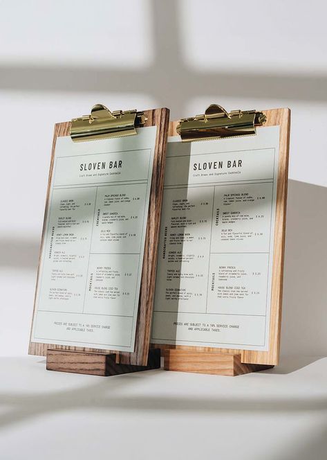 Showcase your menu with our Wood Table Top Menu Holder with Gold Clip, perfect for restaurants and bars. This custom table stand menu is available in various sizes and can be crafted from different types of wood with your choice of coating. The golden binder clip securely holds your menu or sign in place, while the option to engrave your logo on the board adds a personalized touch. Table Top Display Stand, Blended Cocktail, Digital Menu, Menu Holders, Table Tents, Different Types Of Wood, Table Stand, Reserved Signs, Menu Board