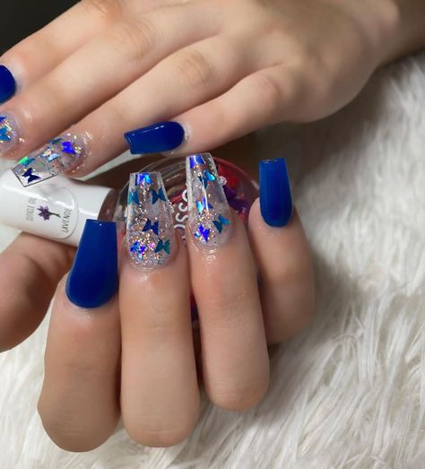 Royal Blue Acrylic Nails Butterfly, Blue Glitter Butterfly Nails, Navy Blue Butterfly Nails, Short Almond Ombre Acrylic Nails, Blue Butterfly Nails Acrylics, Royal Blue Nails With Butterflies, Royal Blue Nails For Quinceanera, Butterfly Acrylic Nails, Blue Butterfly Nails