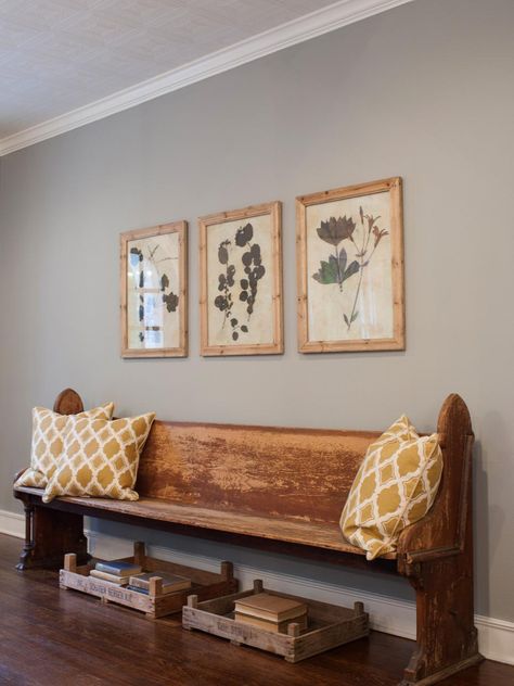 An entryway bench can double as a staging area for trips or the daily grind. That's why an old church pew is perfect: It's sturdy and spacious, plus scuffs from daily activity will just add character. Brick Cottage, Fixer Upper House, Stil Rustic, Church Pew, Daily Activity, Foyer Decorating, Daily Grind, Wooden Bench, Magnolia Homes