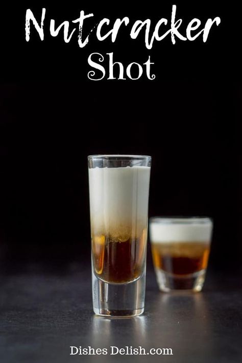 The flavor explosion of the Amaretto, Frangelico and light cream, makes for a scrumptious and beautiful shot! #frangelico #amaretto #nutcrackershot #dishesdelish Kahlua Shots, Types Of Drinks, Christmas Shots, Irish Cream Liqueur, Chocolate Covered Cherries, Boozy Drinks, Shot Recipes, Christmas Dishes, Alcohol Drink Recipes