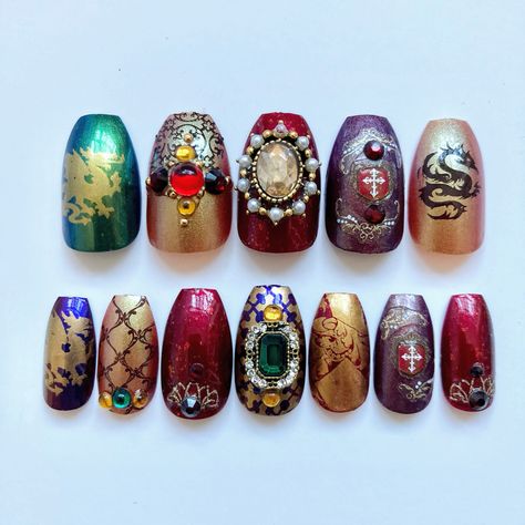 Looking for a really retro manicure? These press medieval nails in rich jewel tones are are just the thing. Medieval Nail Art, Retro Manicure, Fairy Tale Nails, Medieval Nails, Jewel Tone Nails, Eclectic Nails, Nails With Jewels, Bejeweled Nails, London 2023